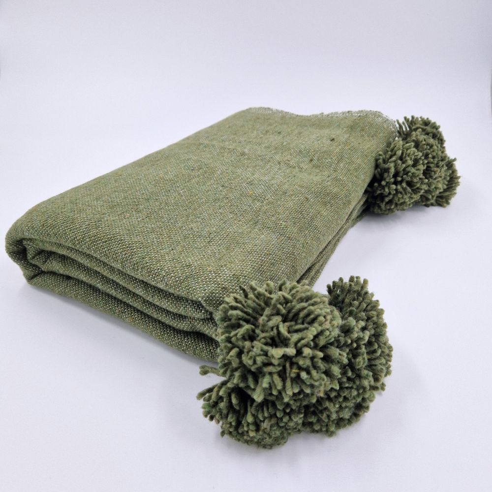 Handmade Moroccan cotton blanket in Seaweed Green color with green pom poms