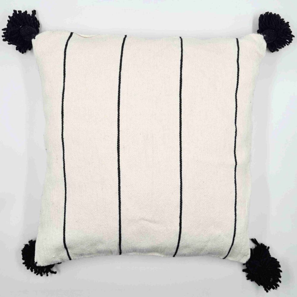 handmade cotton pillow with pom poms