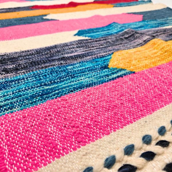 Minimalistic Moroccan Azilal rug with bold geometric patterns in white, brown, blue and multicolor wool, featuring abstract Berber tribal motifs and handwoven texture.