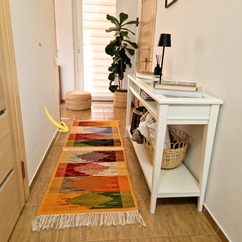 Bohemian Moroccan Azilal rug with bold geometric patterns in red, blue, white and multicolor wool, featuring abstract Berber tribal motifs and handwoven texture.