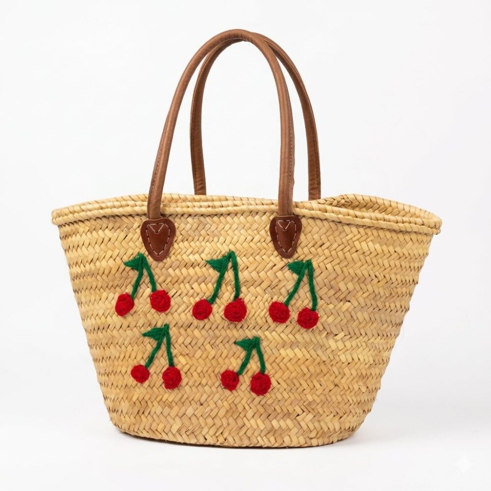 Moroccan cherry basket bag with red crochet cherry clusters, green stem embroidery, and leather handles