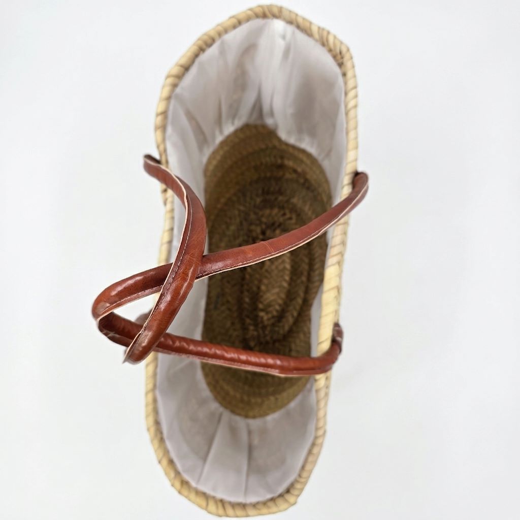 Beach quote basket bag with "Madame à la Plage" hand-stitched in teal thread and leather handles